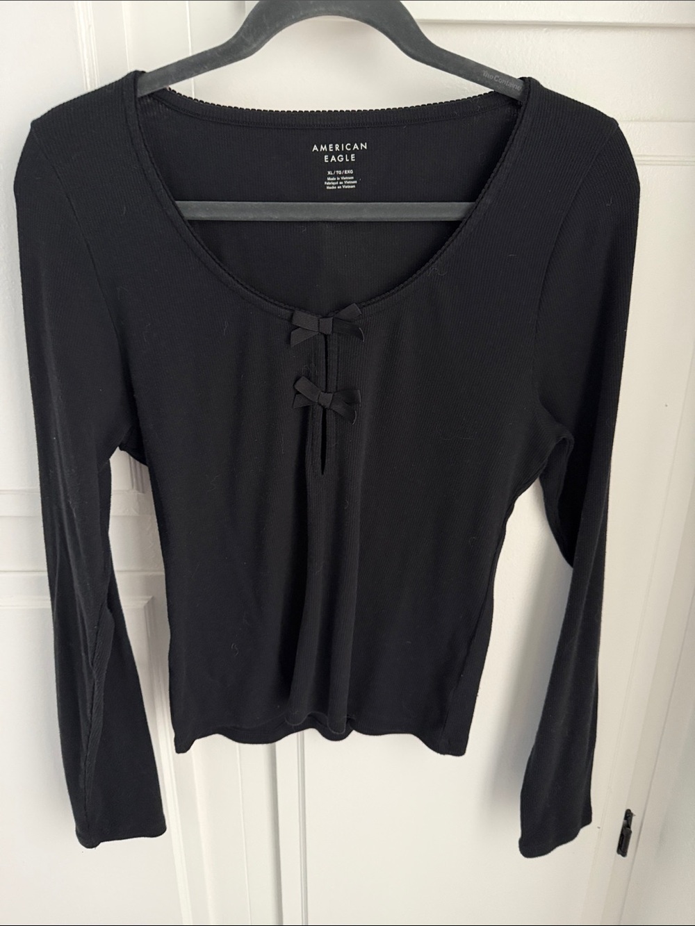 American Eagle Outfitters Black Long-Sleeve Ribbed Top with Front Bow Accents